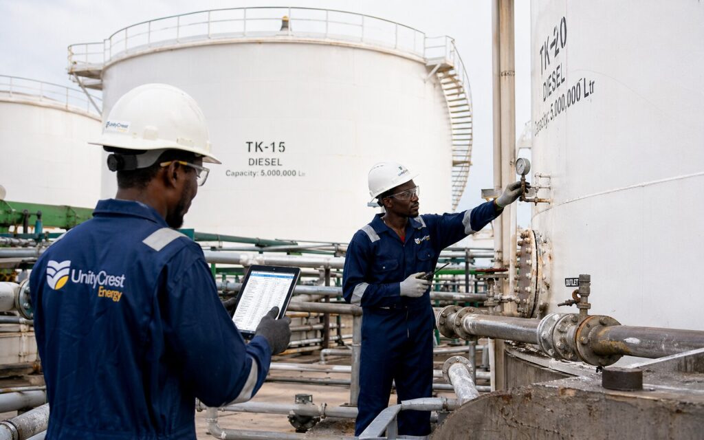 Engineers verifying petroleum product availability at a licensed depot facility.